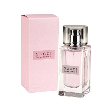 gucci perfume in pink bottle.